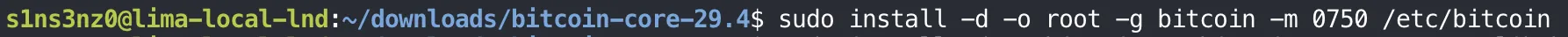 Inside the VM: sudo install -d -o root -g bitcoin -m 0750 /etc/bitcoin, with no output